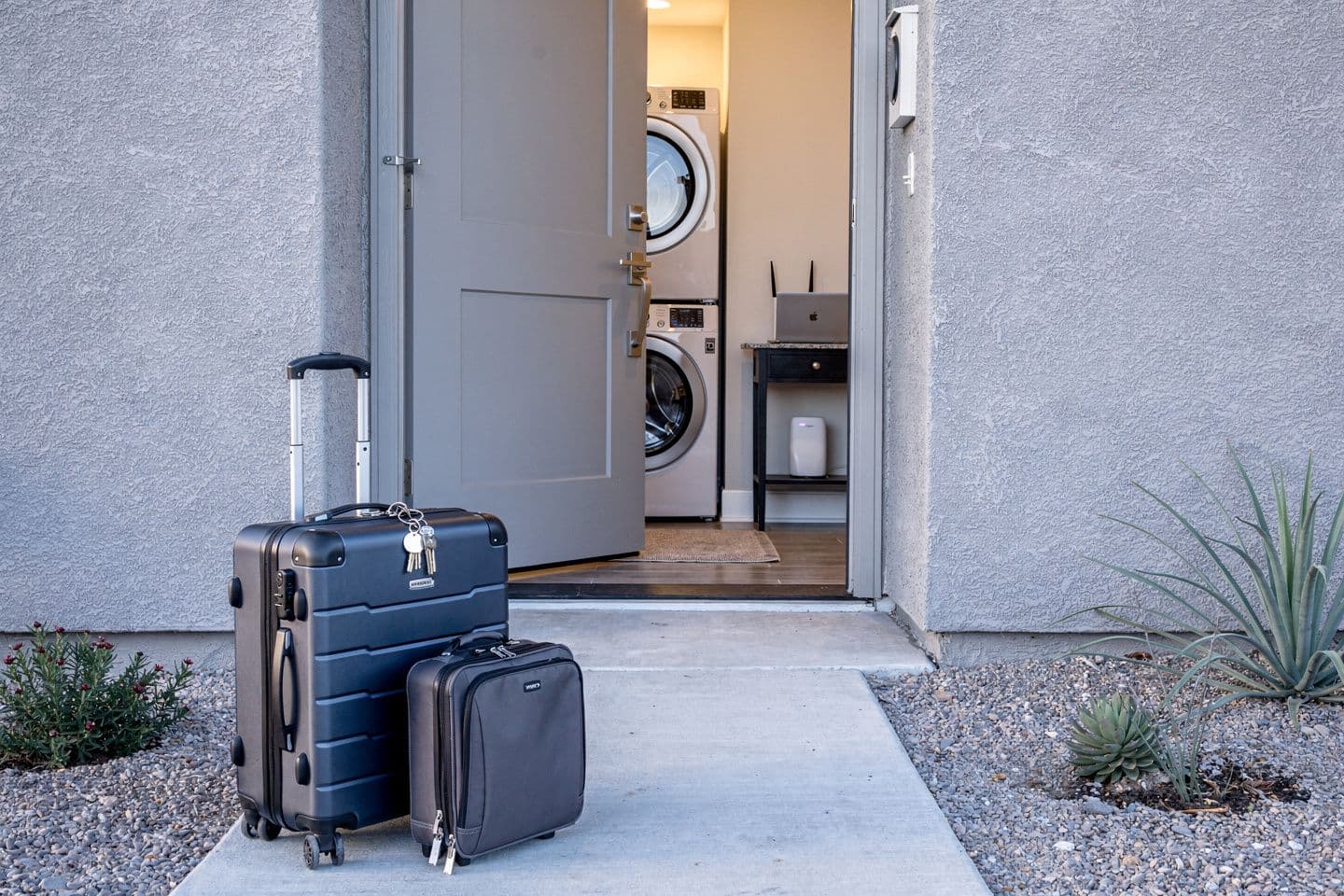 Which short-term rentals near Luke AFB include laundry and Wi-Fi